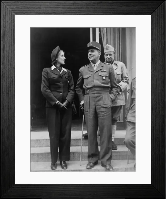 Framed Print : Clare Boothe Luce (1903-1987) standing on steps with Charles de Gaulle in 1944. In 1943, Luce was elected to the US Congress from Connecticut