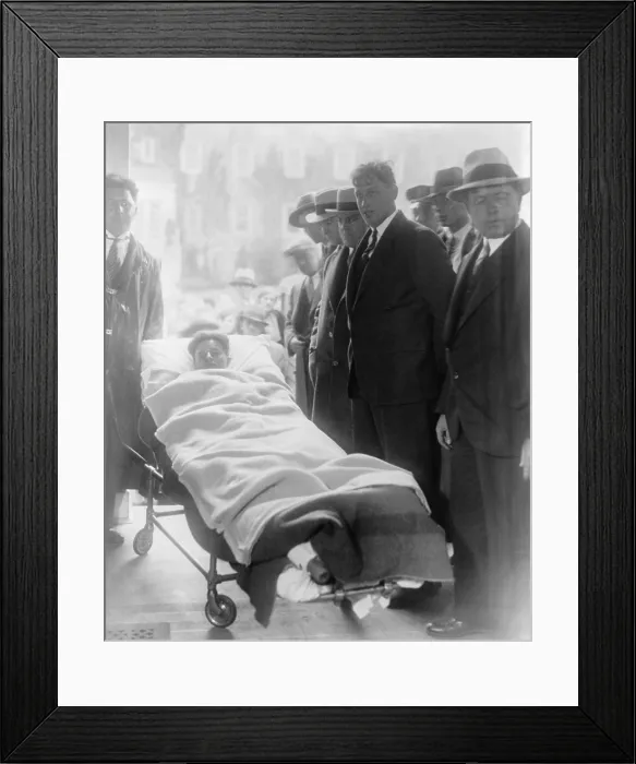 Framed Print : Francis Two Gun Crowley (1911-1932), a robber and cop killer, arrives at his arraignment in a gurney