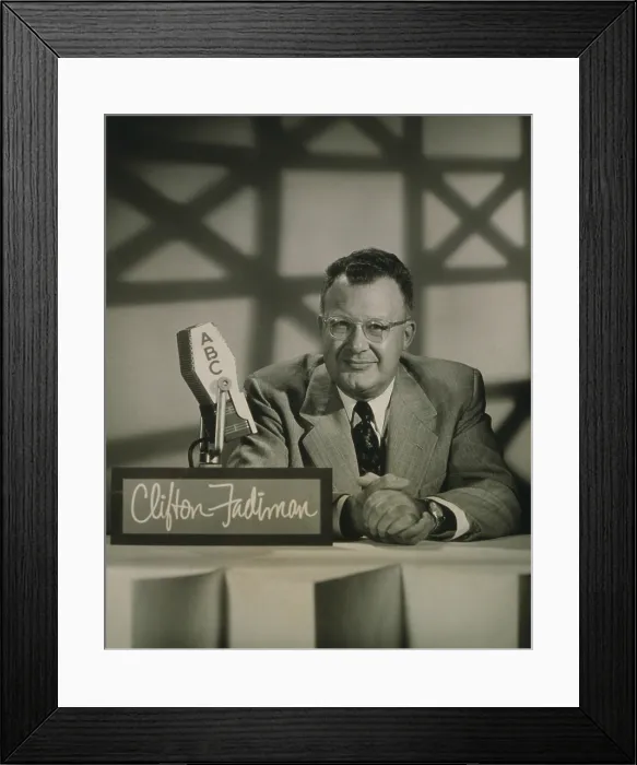Framed Print : Clifton Fadiman (1904-1999), at the microphone hosting the ABC-TV quiz show, THE NAME IS THE SAME in 1955