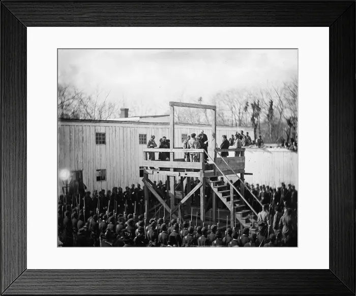 Framed Print : The Civil War, reading the death warrant for the execution of Confederate Officer Henry Wirz, for the crimes of conspiracy and murder, Washington DC, photograph, November 10, 1865