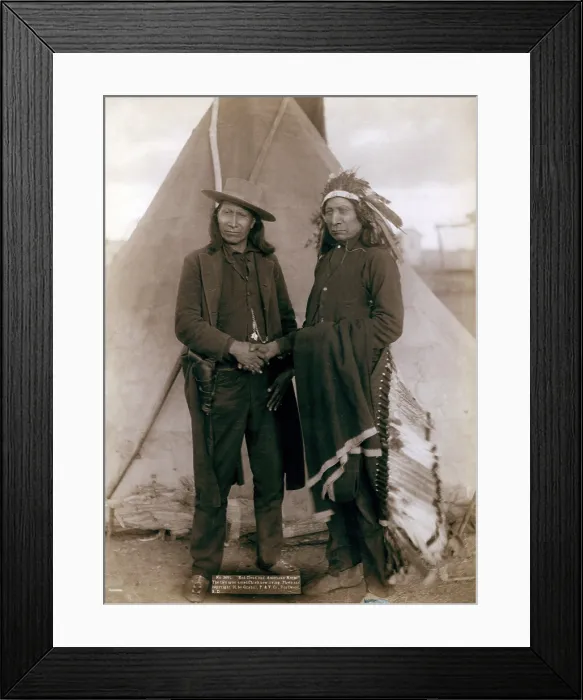 Framed Print : Three Cheyenne men, Standing Elk, No. 1; Running Hog, No. 2; Little Wolf, No. 3, wearing ceremonial clothing and holding rifles with Col. Oelrich, No. 4; Interpreter, No. 5 Framed Print : Three Cheyenne men, Standing Elk, No. 1; Running Hog, No. 2; Little Wolf, No. 3, wearing ceremonial clothing and holding rifles with Col. Oelrich, No. 4; Interpreter, No. 5