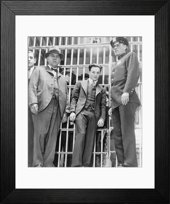 Framed Print : Francis Two Gun Crowley (1911-1932), hand cuffed to a law enforcement officer, as he leaves the jail in Mineola, New York