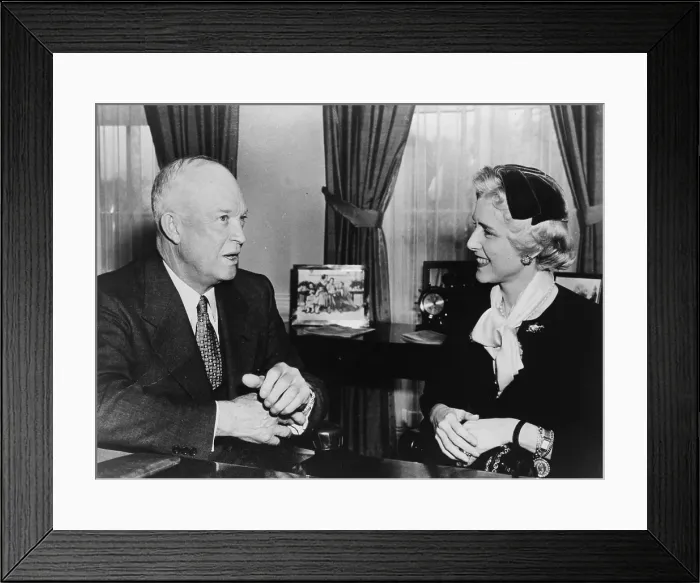 Framed Print : Clare Boothe Luce (1903-1987) talking with President Dwight Eisenhower in 1955. Eisenhower had appointed her US ambassador to Italy