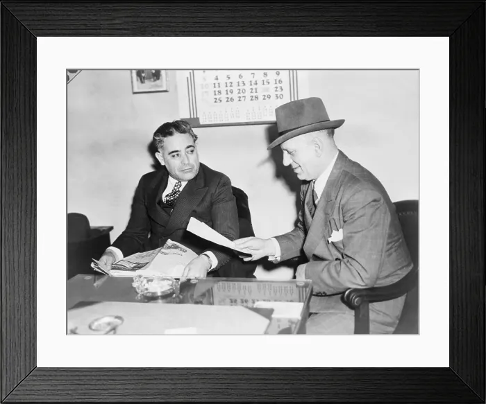 Framed Print : Louis Capone (1896-1944), being questioned by Detective John Osnato regarding the cut-rate murder syndicate, later known as Murder, Inc. operating in Brooklyn, New York