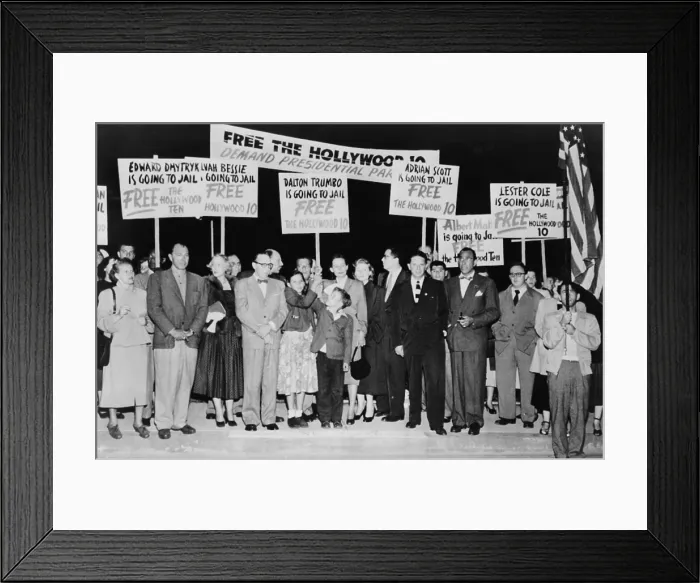 Framed Print : Dalton Trumbo (1905-1976) surrounded by supporters with signs