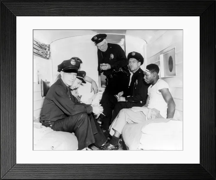 Framed Print : Policemen and wounded African American man inside police ambulance, during the Zoot Suit riot of 1943