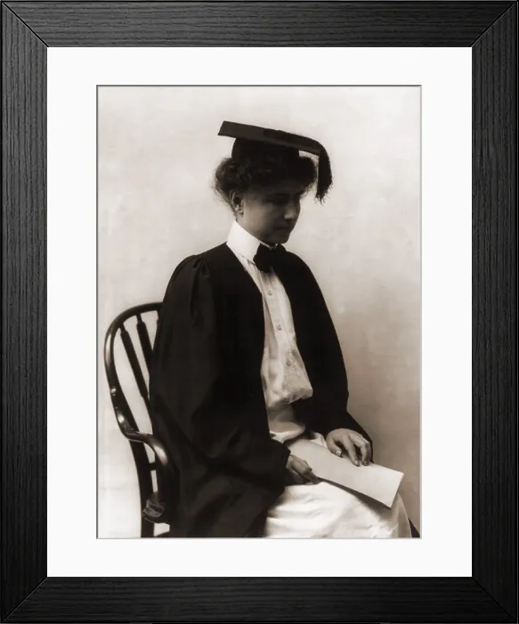 Framed Print : Helen Adams Keller (1880-1968), wearing academic cap and gown in 1904. Keller was blind and deaf, and her education broke barriers for the disabled