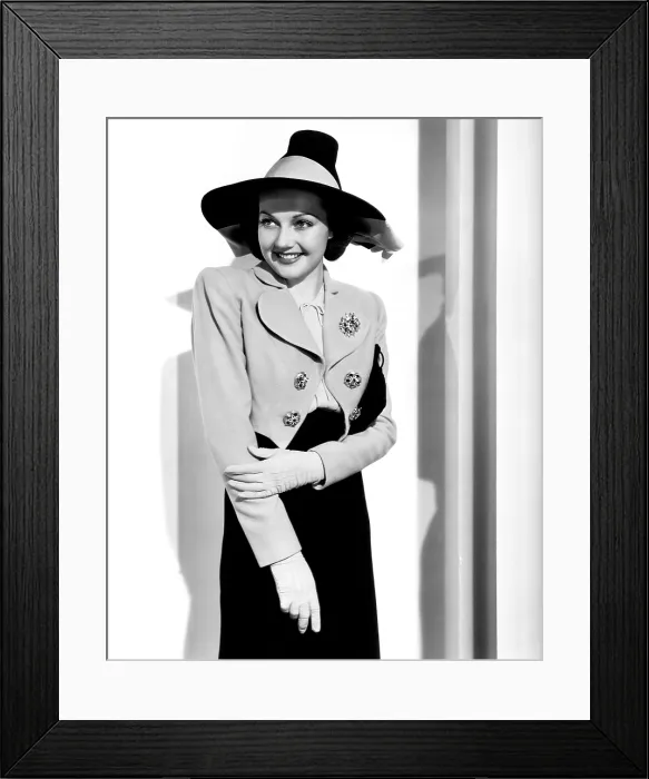 Framed Print : HOTEL FOR WOMEN, Lynn Bari, in a chartreuse bolero jacket with jeweled buttons by Gwen Wakeling, 1939. TM and copyright 20th Century Fox Film Corp