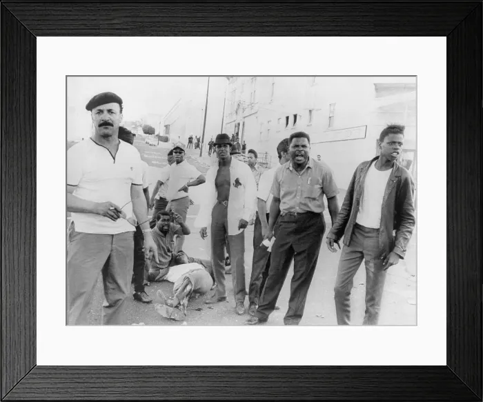 Framed Print : African Americans shout obscenities at police who fired upon them, wounding two, during rioting in San Francisco's Hunters Point area. December 12, 1966