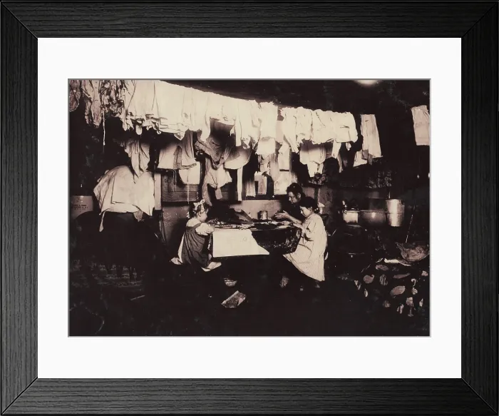 Framed Print : Making artificial leaves in tenement attic, the Ceru family, including children, at work, The 5-year-old helps. Her sister, aged 10, works till 9 P.M Framed Print : Making artificial leaves in tenement attic, the Ceru family, including children, at work, The 5-year-old helps. Her sister, aged 10, works till 9 P.M
