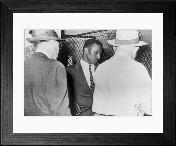 Framed Print : Civil Rights leader Fred Shuttlesworth being booked at the Birmingham Police Station in connection with attempts to desegregate buses. May 19, 1961