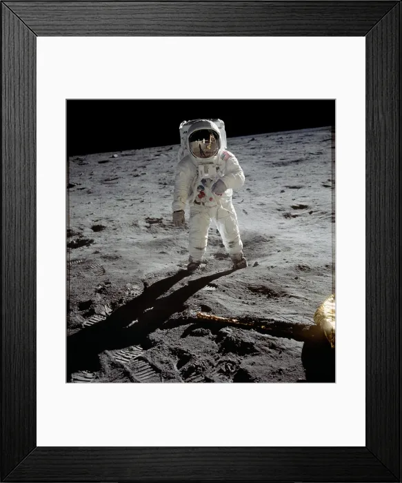 Framed Print : Apollo 11 Astronaut Edwin Aldrin on the Moon. Neil Armstrong and the Lunar Module are reflected in Aldrin's gold visor. July 20, 1969