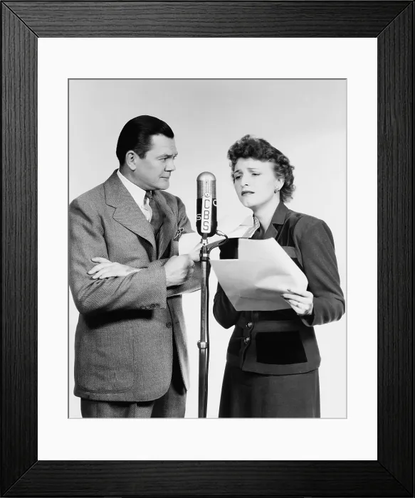 Framed Print : Voice actors Marjorie Hannan and Hugh Studebaker (1900-1973) performing at C.B.S. Radio microphone for the radio show BACHELOR'S CHILDREN in 1947 Framed Print : Voice actors Marjorie Hannan and Hugh Studebaker (1900-1973) performing at C.B.S. Radio microphone for the radio show BACHELOR'S CHILDREN in 1947