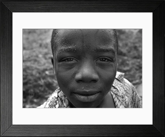 Framed Print : CONGO, Democratic Republic of the. NORTH KIVU. Democratic Republic of the Congo (2008). Kivu Conflict. Refugee camp of Mugunga I (20000 people). Boy Framed Print : CONGO, Democratic Republic of the. NORTH KIVU. Democratic Republic of the Congo (2008). Kivu Conflict. Refugee camp of Mugunga I (20000 people). Boy