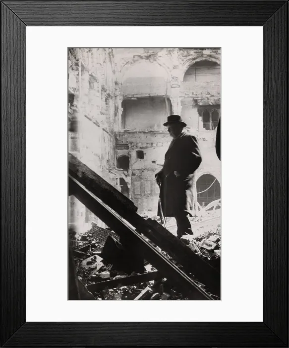 Framed Print : Winston Churchill inspecting bomb damage in the House of Commons debating chamber on May 11, 1941