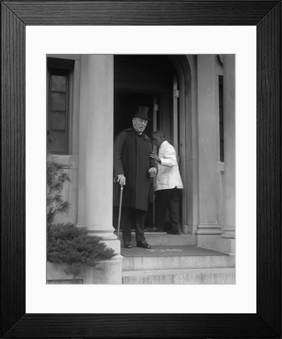 Framed Print : Ex-President Woodrow Wilson (1856-1924), weakened by a severe stroke in 1919, is supported by an African American servant