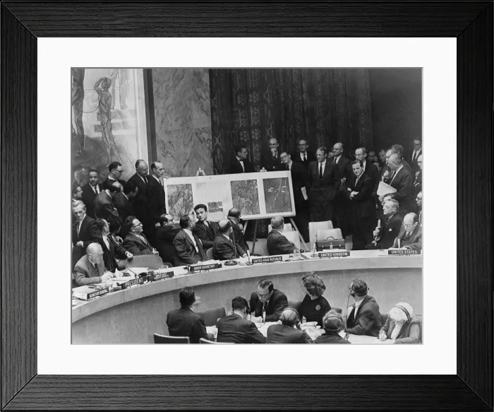 Framed Print : Adlai Stevenson describes location of missile sites in Cuba using aerial photographs during a United Nations Security Council meeting in New York. October 25, 1962