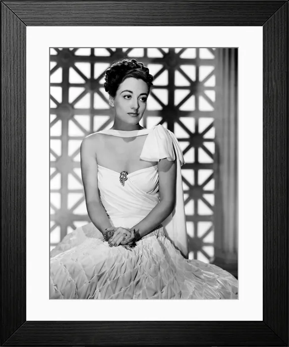 Framed Print : THE SHINING HOUR, Joan Crawford, in a white silk gown with quilted skirt by Adrian, 1938 Framed Print : THE SHINING HOUR, Joan Crawford, in a white silk gown with quilted skirt by Adrian, 1938