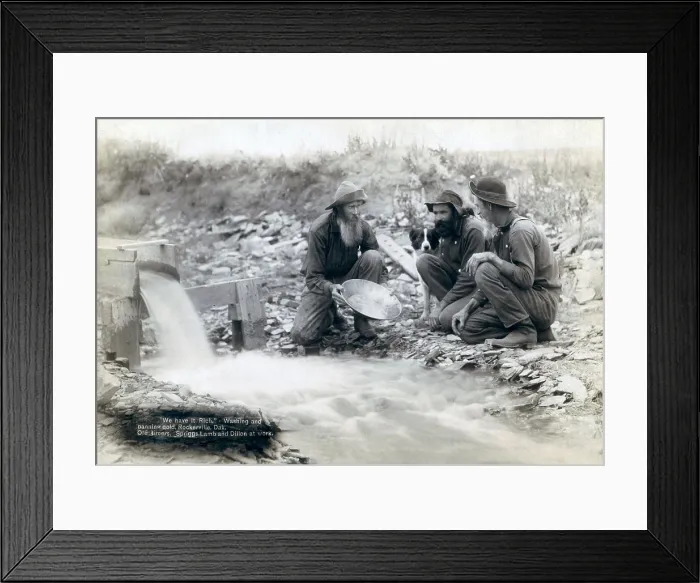 Framed Print : Three men, with dog, panning for gold in a stream in the Black Hills of South Dakota in 1889