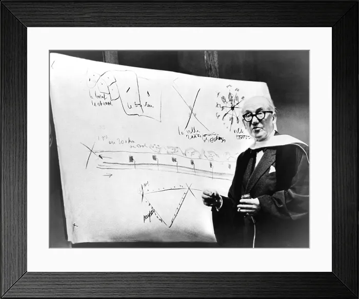 Framed Print : Le Corbusier (1887-1965), during a 1961 lecture, using design sketches. Le Corbusier was among the first generation architects who discarded the classical Greco-Roman vocabulary Framed Print : Le Corbusier (1887-1965), during a 1961 lecture, using design sketches. Le Corbusier was among the first generation architects who discarded the classical Greco-Roman vocabulary