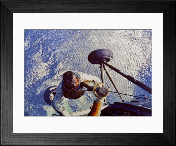 Framed Print : Astronaut Alan B. Shepard is hoisted aboard a U.S. Marine helicopter after splashdown of his Freedom 7 Mercury space capsule
