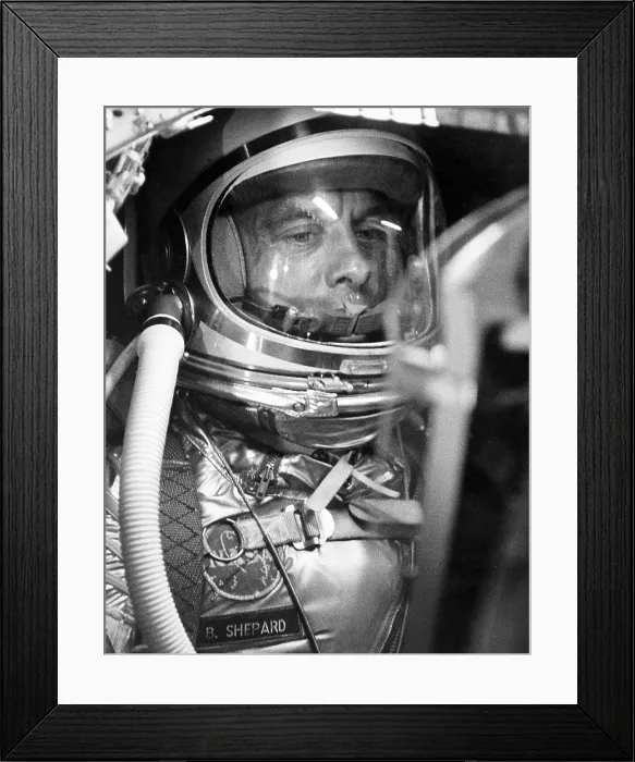 Framed Print : Astronaut Alan Shepard inside the Mercury capsulein a flight simulation a week before his historic sub-orbital flight on May 5, 1961