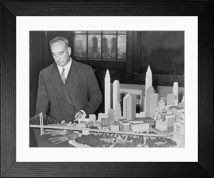 Framed Print : New York City Park Commissioner Robert Moses (1888-1981) with model of proposed Battery Bridge in 1939