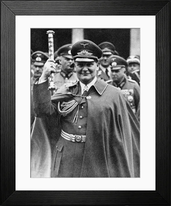Framed Print : Hermann Goering (1893-1946), holding up his Fieldmarshall's baton at Air Force day parade. March 1, 1938