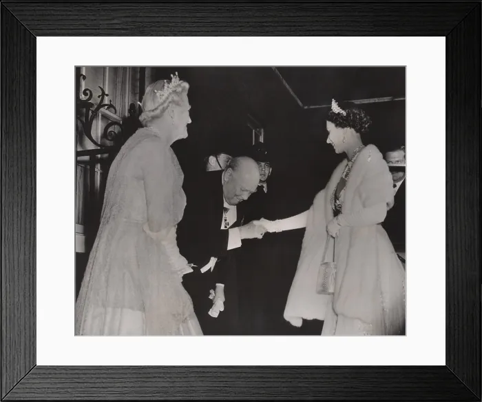 Framed Print : Prime Minister Winston Churchill and Lady Churchill bows to Queen Elizabeth as she arrives at his retirement dinner in London, April 4, 1955