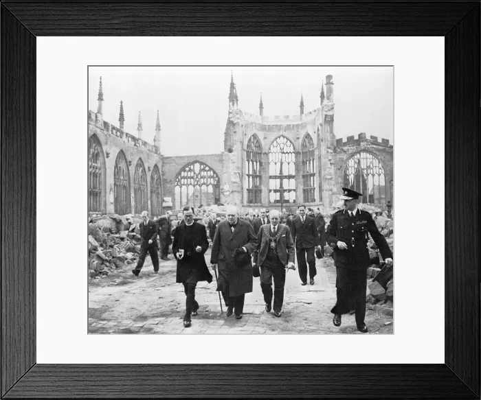 Framed Print : Winston Churchill (1874-1965), walks with members of the Anglican clergy through the ruins of Coventry Cathedral which was destroyed by the German bombing on November 15, 1940
