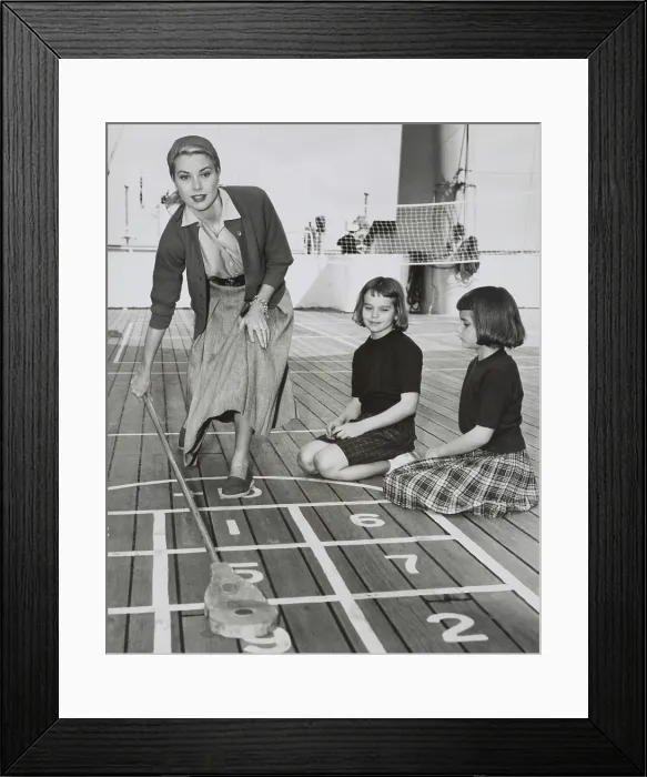 Framed Print : Grace Kelly by playing shuffleboard on the deck of the USS Constitution, April 10, 1956