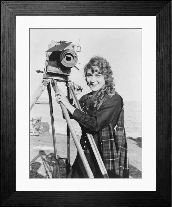 Framed Print : Mary Pickford, American movie star, wearing a kimono, reading a letter, Feb. 1918. In August 1918, Pickford declined to renew her contract with Adolph Zukor Framed Print : Mary Pickford, American movie star, wearing a kimono, reading a letter, Feb. 1918. In August 1918, Pickford declined to renew her contract with Adolph Zukor