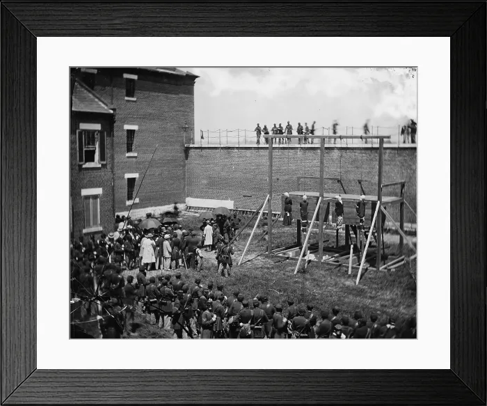 Framed Print : The assassination of President Abraham Lincoln, hanging hooded bodies of the four conspirators, (Mary E. Surratt, Lewis Payne, David E)