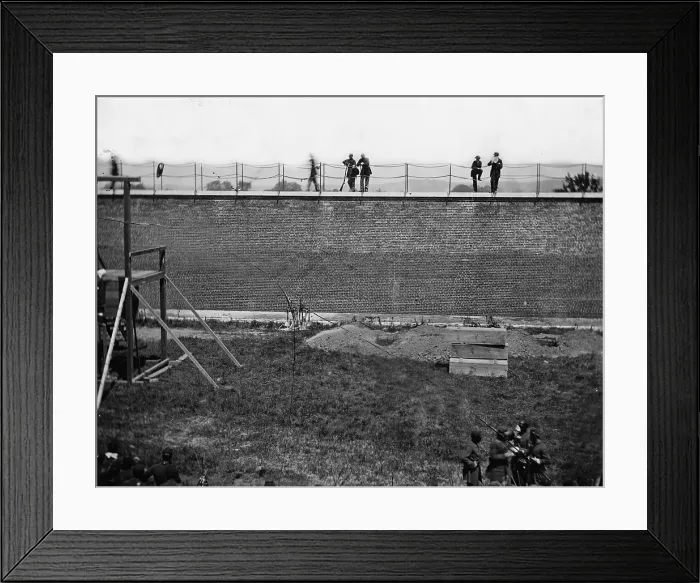 Framed Print : The assassination of President Abraham Lincoln, coffins and open graves ready for the conspirators bodies at right of scaffold, Washington DC