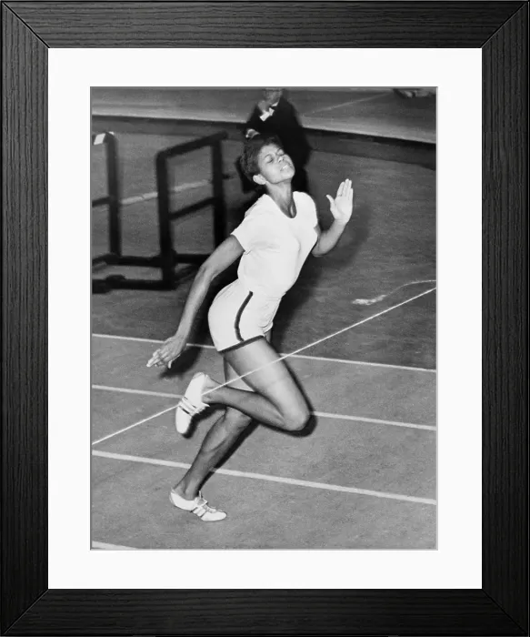 Framed Print : Wilma Rudolph sets a World record for the indoor 60-yard sprint Madison square Garden. The Olympic Triple Gold Medal Winner, ran won the race in 6.8 seconds. February 17, 1961
