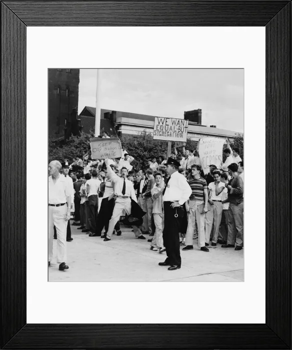Framed Print : White teen-agers at Baltimore's City Hall in protest against school integration. One of their signs reads, Southern don't want Negroes'. 1955