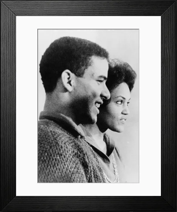 Framed Print : Hamilton Holmes and Charlayne Hunter laugh during a news interview after a court order struck down their suspension from the University of Georgia for their own safety
