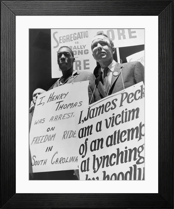Framed Print : Freedom Riders James Peck, head bandaged, with Henry Thomas, each wearing a placard, picketing outside the New York City Port Authority Trailways bus terminal. May 17, 1961