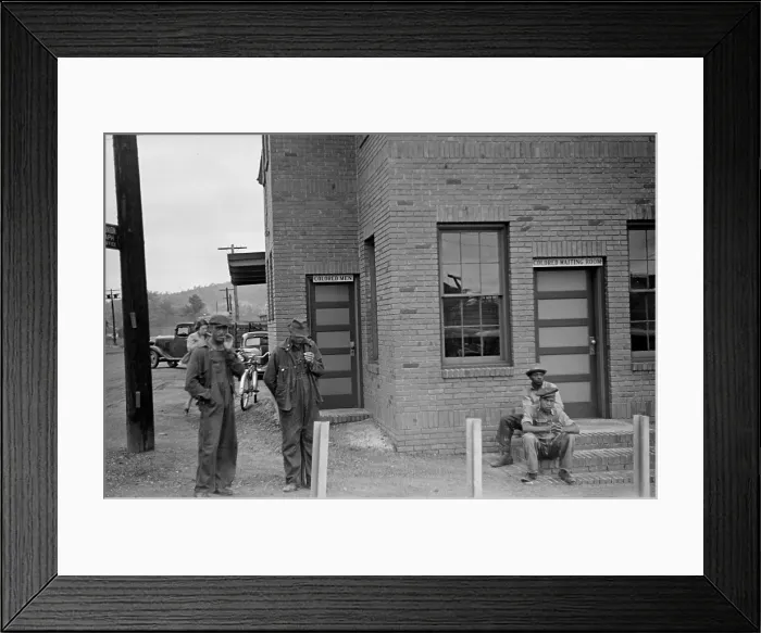 Framed Print : Colored Waiting Room sign. Four African American men stand outside of the Manchester, Georgia, railroad station. May 1938 Framed Print : Colored Waiting Room sign. Four African American men stand outside of the Manchester, Georgia, railroad station. May 1938