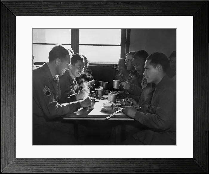 Framed Print : African American, Chinese, Puerto Rican, and White US soldiers eating together in a mess hall. They are all serving at the Army Quartermaster Supply Depot in England. 1944