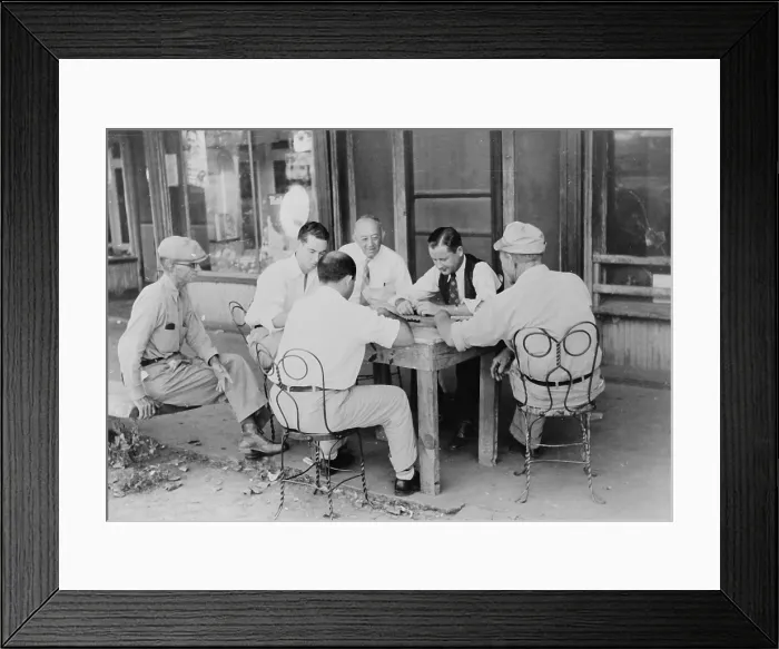 Framed Print : Playing dominoes or cards in front of drug store in center of town in Mississippi Delta, Mississippi, photograph by Marion Post Wolcott, 1939 Framed Print : Playing dominoes or cards in front of drug store in center of town in Mississippi Delta, Mississippi, photograph by Marion Post Wolcott, 1939