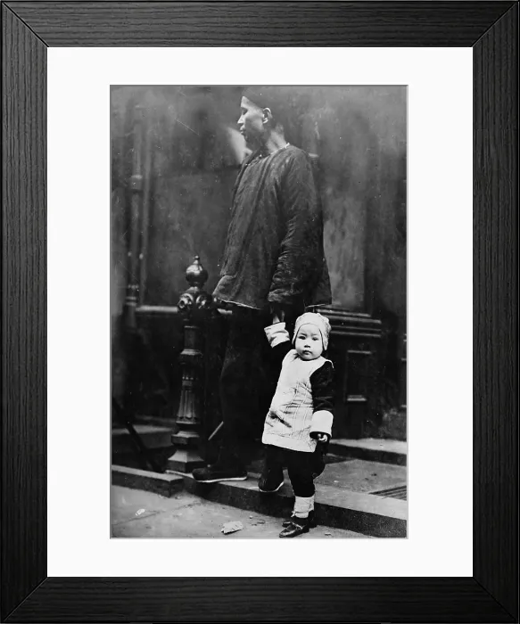 Framed Print : Chinese New Year, Chinese child with an adult on step outside of building, Chinatown, New York City, photograph, 1909