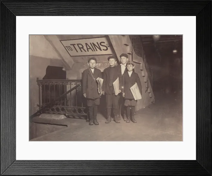 Framed Print : Child labor, boys selling newspapers by subway, New York City, photograph by Lewis Wickes Hine, July, 1910