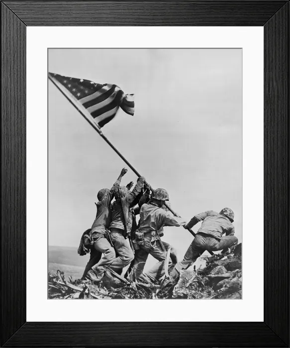 Framed Print : American Marines raising US flag on Mount Suribachi, Iwo Jima, Feb. 23, 1945. This is the second flag raising, using a larger flag visible to marines still fighting below