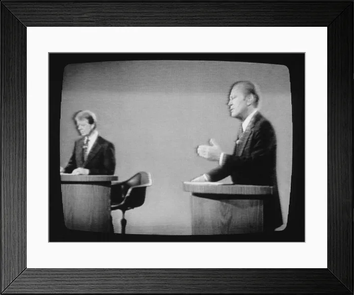 Framed Print : President Gerald Ford and Jimmy Carter on television during their first presidential debate. Polls taken after the debate showed that most viewers felt that Ford was the winner Framed Print : President Gerald Ford and Jimmy Carter on television during their first presidential debate. Polls taken after the debate showed that most viewers felt that Ford was the winner