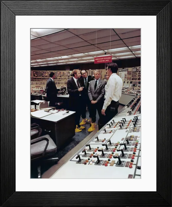 Framed Print : Wearing yellow plastic boots to protect against nuclear contamination President Jimmy Carter visits the Control Room of Three Mile Island Nuclear Generating Station four days