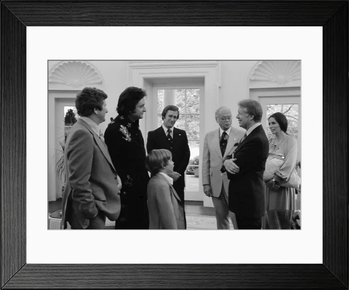 Framed Print : Jimmy Carter with Johnny Cash and his family in the Oval Office. Ca. 1977-1980