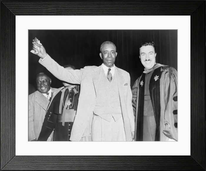 Framed Print : E.D. Nixon, one of the leaders of the Montgomery Alabama Bus Boycott is cheered by New York City crowds. Congressman Adam Clayton Powell stands at his right. 1956