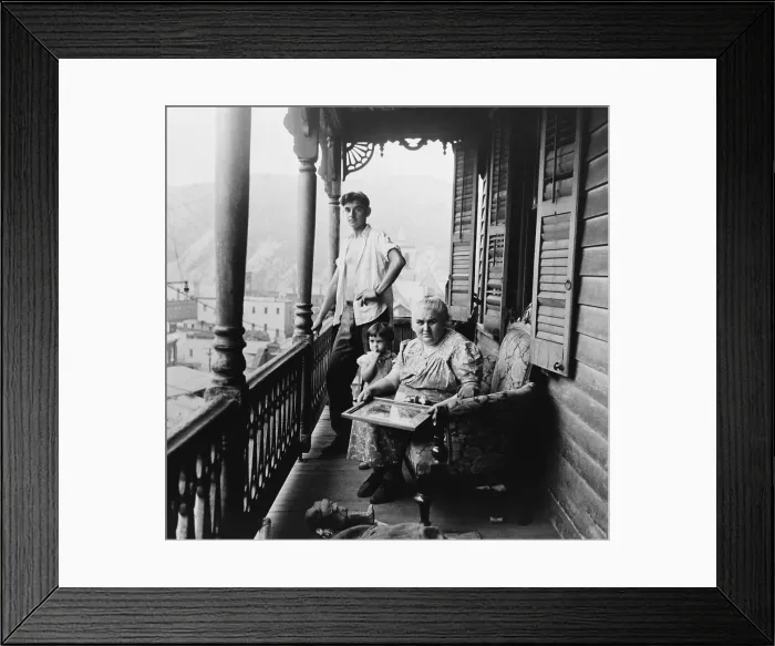 Framed Print : Polish family on the balcony of their apartment on High Street in Mauch Chunk, Pennsylvania. August 1940 photograph by Jack Delano