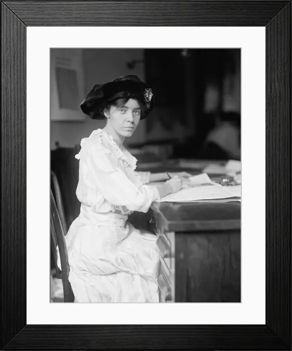 Framed Print : Alice Paul (1885-1977), militant American Suffragette leader and feminist at her desk in 1915